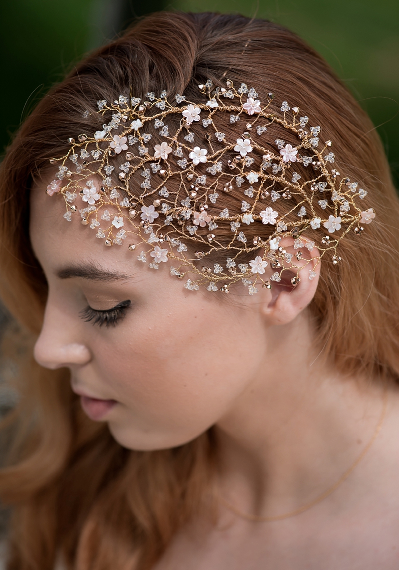 Into The Clouds - A 1940s Inspired Shoot | Ps With Love Jewellery and Accessories Close up of one of the bridal headpieces featuring gold accents, crystals and small flowers